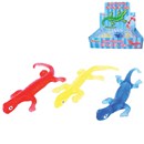 Sticky Lizard in assorted colours. Throw it to a  wall or window and watch it slide its way down  slowly. Length 20cm. Age 3+